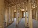 Framed interior highlighting plumbing and electrical plans, showcasing the home's construction at 56 Bailey-Boykin Rd, Selma, NC 27576