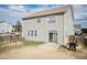 Exterior view of the home with a patio and grill at 6100 Paducah Dr, Raleigh, NC 27610