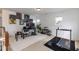 Versatile bonus room featuring home office and gym, with natural light and ample space at 6100 Paducah Dr, Raleigh, NC 27610