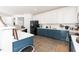 Bright kitchen with two-tone cabinetry, quartz countertops and stainless steel appliances at 6100 Paducah Dr, Raleigh, NC 27610