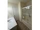 Bathroom with tub and shower combination at 6102 Highcastle Ct, Raleigh, NC 27613
