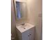 Bathroom featuring a white vanity with a mirror and a light fixture at 6102 Highcastle Ct, Raleigh, NC 27613