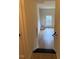 View of the home's bright foyer and staircase at 6102 Highcastle Ct, Raleigh, NC 27613