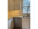 Kitchen featuring white cabinets, granite countertops, stainless steel sink and subway tile backsplash at 6102 Highcastle Ct, Raleigh, NC 27613
