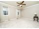 Bedroom featuring carpet flooring, curtains, and natural light from the large window at 6469 New Market Way, Raleigh, NC 27615