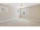 Neutral bedroom with two windows and a ceiling fan at 75 Morgan Dr, Lillington, NC 27546