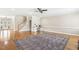 Spacious living area with hardwood floors, staircase access, and a built-in desk area at 75 Morgan Dr, Lillington, NC 27546