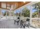 A screened-in porch with comfortable seating provides an ideal outdoor living space at 75 Morgan Dr, Lillington, NC 27546