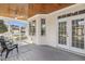 A screened-in porch with comfortable seating provides an ideal outdoor living space at 75 Morgan Dr, Lillington, NC 27546