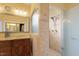Elegant bathroom showcasing walk-in shower, granite vanity, and contemporary fixtures at 836 Canyoncreek Ln, Fuquay Varina, NC 27526