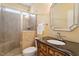 Bathroom with a glass-enclosed shower, and a vanity with a vessel sink and ornate mirror at 836 Canyoncreek Ln, Fuquay Varina, NC 27526