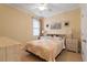 Comfortable bedroom featuring a decorative quilt, bedside tables, and soft lighting at 836 Canyoncreek Ln, Fuquay Varina, NC 27526