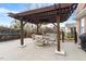 Pergola with outdoor dining set at 836 Canyoncreek Ln, Fuquay Varina, NC 27526