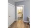 En-suite bathroom featuring a modern vanity with granite countertop at 103 1St St, Haw River, NC 27258