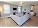 Comfortable living room with ample seating, modern decor, and natural light from large windows at 103 1St St, Haw River, NC 27258