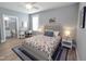 Spacious main bedroom with a king-size bed, en-suite bathroom, and ample natural light at 103 1St St, Haw River, NC 27258