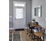 Home office featuring a sleek desk, comfortable chair, and a bright window for natural light at 103 1St St, Haw River, NC 27258