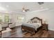 Large main bedroom features a trey ceiling, sitting area, and hardwood floors at 123 Stone Park Dr, Wake Forest, NC 27587