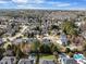 An aerial view of the houses in the area, highlighting amenities such as the pool and tennis court at 12409 Village Gate Way, Raleigh, NC 27614