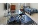 Comfortable bedroom with a computer and glass desk at 12409 Village Gate Way, Raleigh, NC 27614