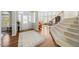 Inviting foyer with hardwood floors, staircase, and lots of natural light at 12409 Village Gate Way, Raleigh, NC 27614