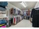 Walk-in closet with generous hanging and shelf space at 12409 Village Gate Way, Raleigh, NC 27614