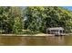 Picturesque waterfront property with a private boat dock, offering direct access to the water at 1315 Sagamore Dr, Louisburg, NC 27549