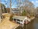 Waterfront home with a private boat dock and lift for easy lake access and enjoyment of waterfront living at 1315 Sagamore Dr, Louisburg, NC 27549