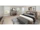 Cozy bedroom features neutral decor, large windows, and ample space for relaxation at 141 W Falcon Ct., Clayton, NC 27520