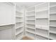 A spacious walk-in closet with ample shelving and storage at 141 W Falcon Ct., Clayton, NC 27520