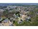 Aerial view of the property situated amongst mature trees in a desirable neighborhood at 1716 Turtle Ridge Way, Raleigh, NC 27614
