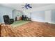 Spacious bonus room with a home office, hardwood flooring, and lots of natural light at 1716 Turtle Ridge Way, Raleigh, NC 27614