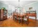 Formal dining room boasts hardwood floors, crown molding, and space for a large dining table at 1716 Turtle Ridge Way, Raleigh, NC 27614