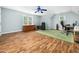 Spacious flex room with hardwood floors, multiple windows, and ample space for a home office at 1716 Turtle Ridge Way, Raleigh, NC 27614
