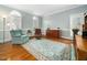 Inviting living room with hardwood floors, plantation shutters, and comfortable seating arrangements at 1716 Turtle Ridge Way, Raleigh, NC 27614