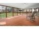 Beautiful screened porch with wood floors and ceilings with a view to the backyard at 1716 Turtle Ridge Way, Raleigh, NC 27614