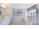 Elegant bathroom featuring double vanity, soaking tub, glass shower, and neutral tones at 201 Hiddenite Pl, Holly Springs, NC 27540