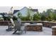 Cozy outdoor fire pit with Adirondack chairs, perfect for relaxing evenings with friends and Gathering in the community at 201 Hiddenite Pl, Holly Springs, NC 27540