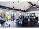 Bright community fitness center with various equipment for a full workout, and ceiling fans for air circulation at 201 Hiddenite Pl, Holly Springs, NC 27540