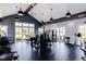 Well-equipped fitness center with treadmills, bikes, and weight machines for residents to maintain an active lifestyle at 201 Hiddenite Pl, Holly Springs, NC 27540
