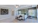 Spacious primary bedroom featuring tray ceiling, ample natural light, and neutral decor at 201 Hiddenite Pl, Holly Springs, NC 27540