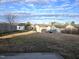 A well-maintained backyard with a grassy lawn and fencing for privacy at 2015 Tennessee Road Rd, Durham, NC 27704