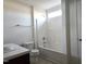 Bathroom featuring a shower-tub combo, toilet, and vanity with sink at 2015 Tennessee Road Rd, Durham, NC 27704