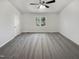 Bright bedroom with neutral walls, ceiling fan, and plush carpeting at 204 Lopez Ln, Clayton, NC 27527