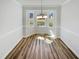 Bright dining room with bay window and hardwood floors at 204 Lopez Ln, Clayton, NC 27527