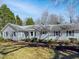 Charming single-story home featuring a well-maintained front yard and classic architectural details at 204 Lopez Ln, Clayton, NC 27527