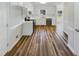 Bright kitchen with stainless steel appliances, white cabinets, and plenty of counter space at 204 Lopez Ln, Clayton, NC 27527