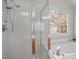 Elegant shower and soaking tub combo with glass enclosure, offering a spa-like experience with natural light at 205 Caniff Ln, Cary, NC 27519