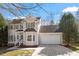 Charming two-story home with attached two-car garage, bay window and a well-manicured front yard at 205 Caniff Ln, Cary, NC 27519