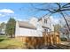 Two-story house with a wooden deck and a fenced yard at 205 Caniff Ln, Cary, NC 27519